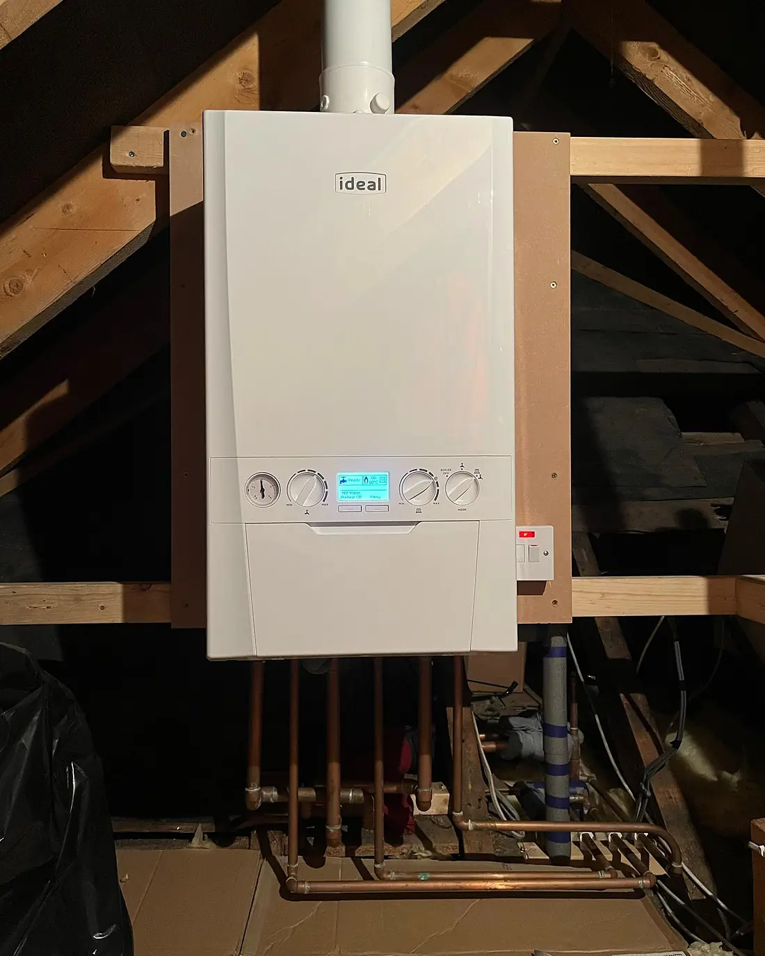 A new Ideal boiler fitted in a loft with fresh copper pipework