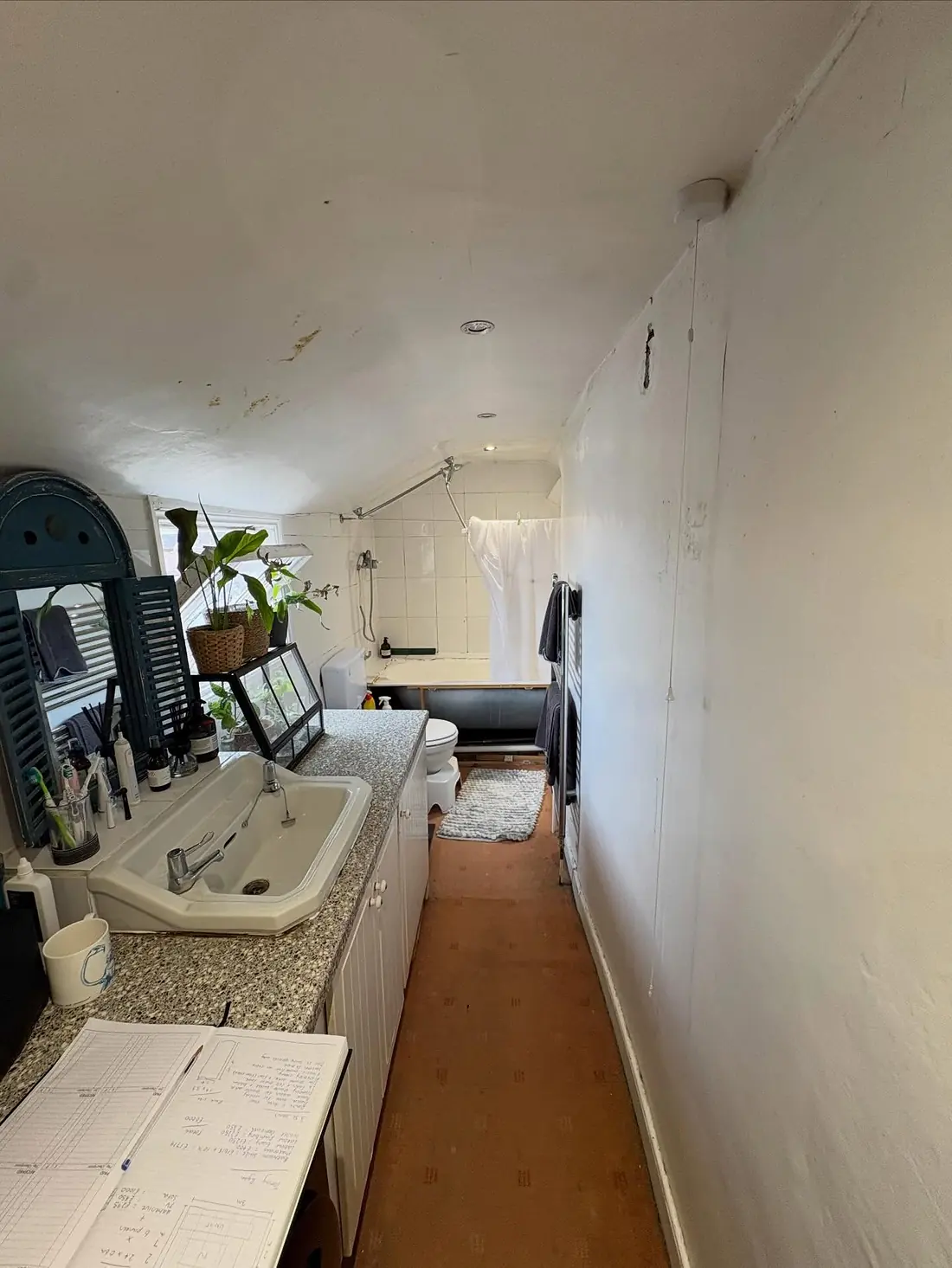 Before: one long room with twin basins along the wall